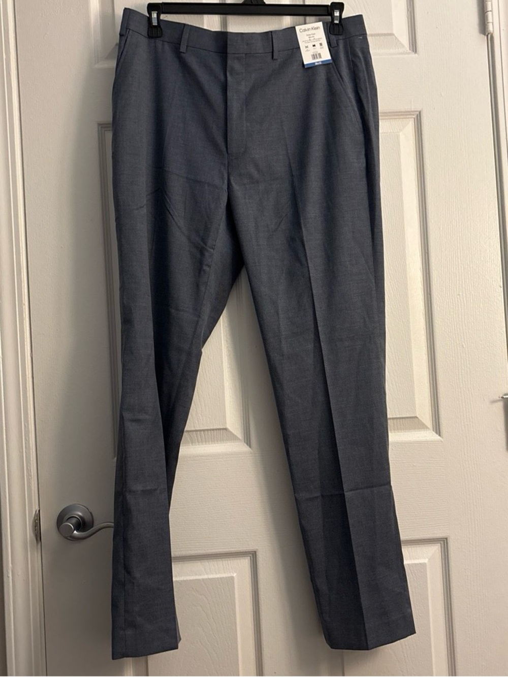 Brand new with tags Calvin Klein slim fit 36x32 blue dress pant